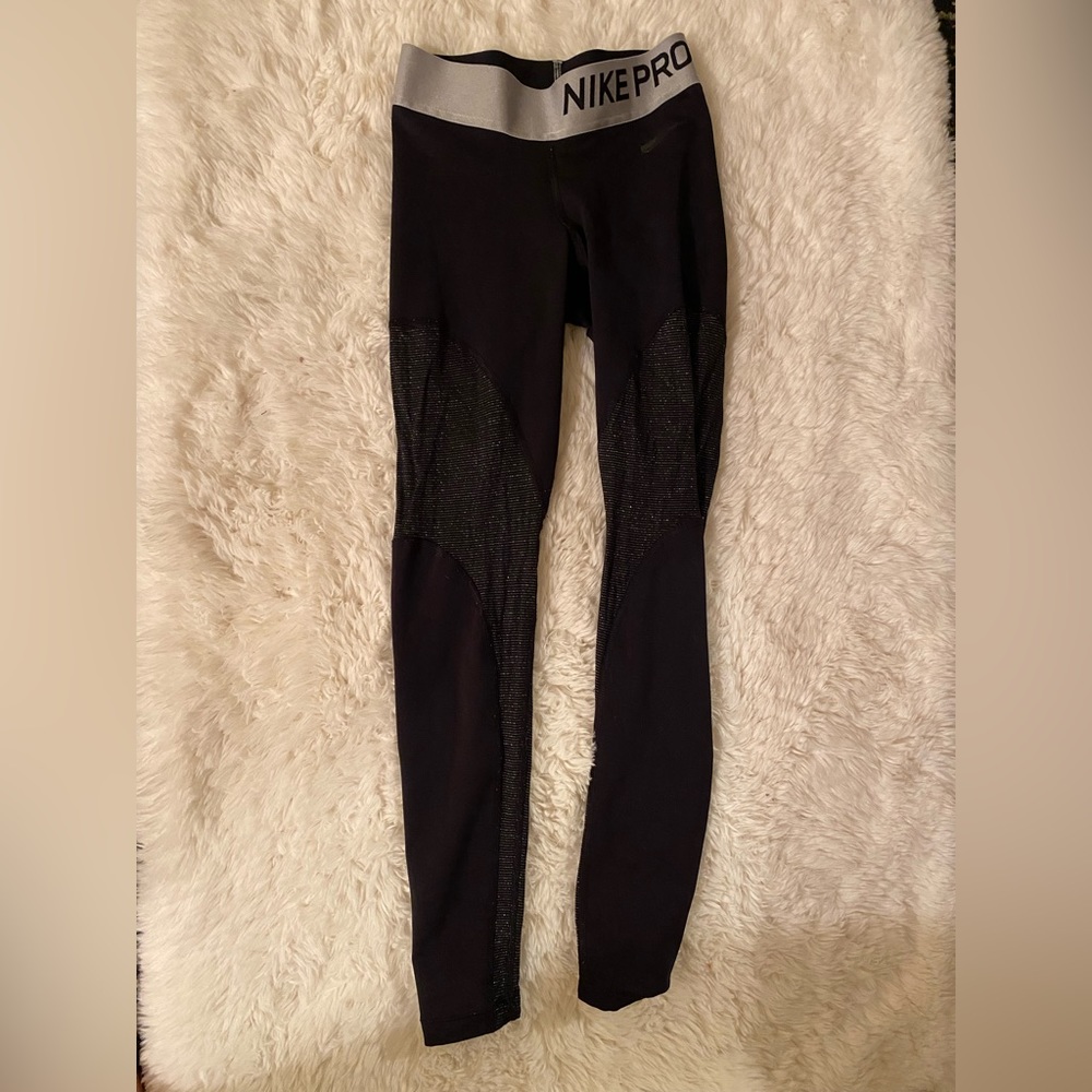Black and shimmery Nike Pro leggings